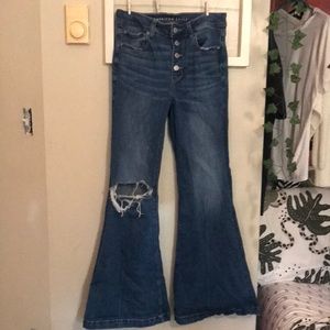 a light blue American Eagle flare ripped jeans. the size is size four. stretchy